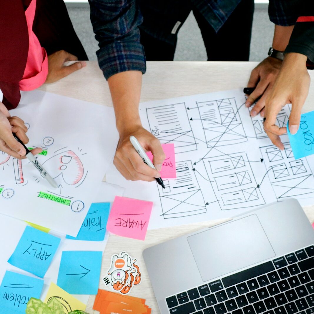 person writing on white paper